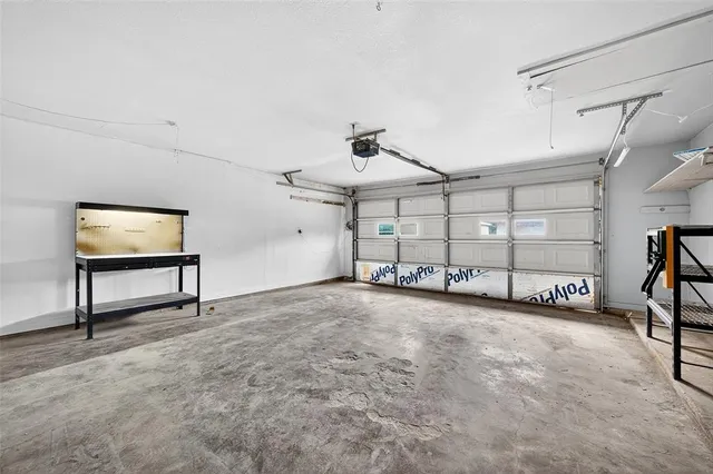a view of a livingroom with furniture and a ceiling fan