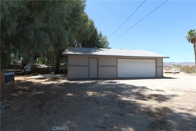 a view of a lake with a yard