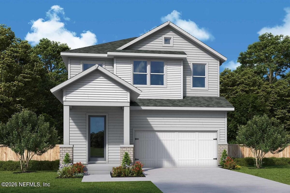 6070 Timber Pines Road Jacksonville, FL 32224 - Photo 1 of 3 a front view of a house with a yard and garage