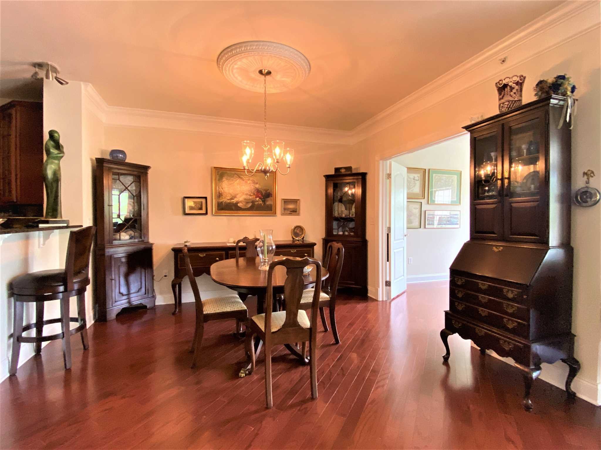 643 Regency Drive Fishkill, NY 12524 - Photo 14 of 37 a view of a dining room with furniture and wooden floor