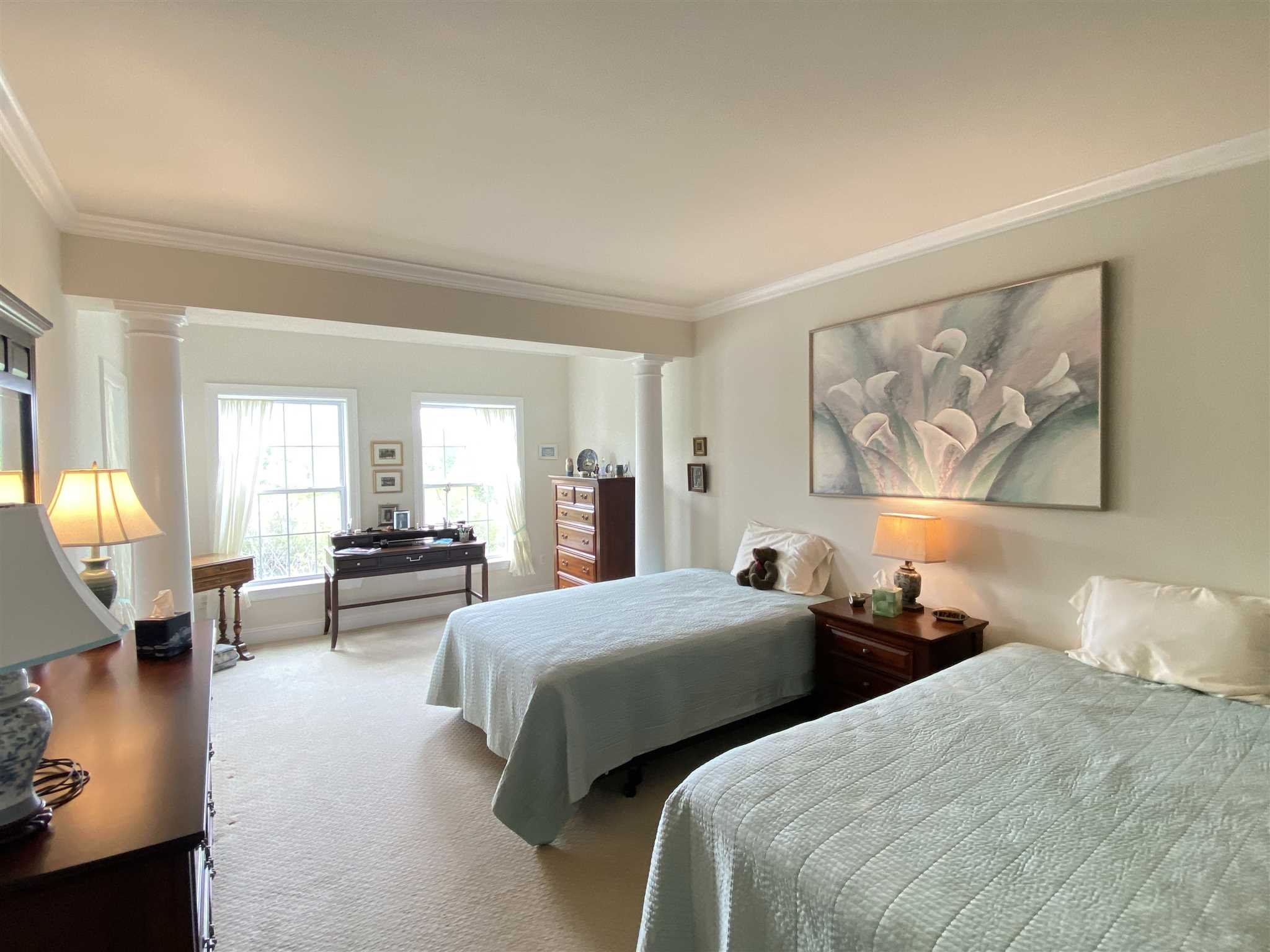 643 Regency Drive Fishkill, NY 12524 - Photo 16 of 37 a bedroom with two beds and painting on the wall