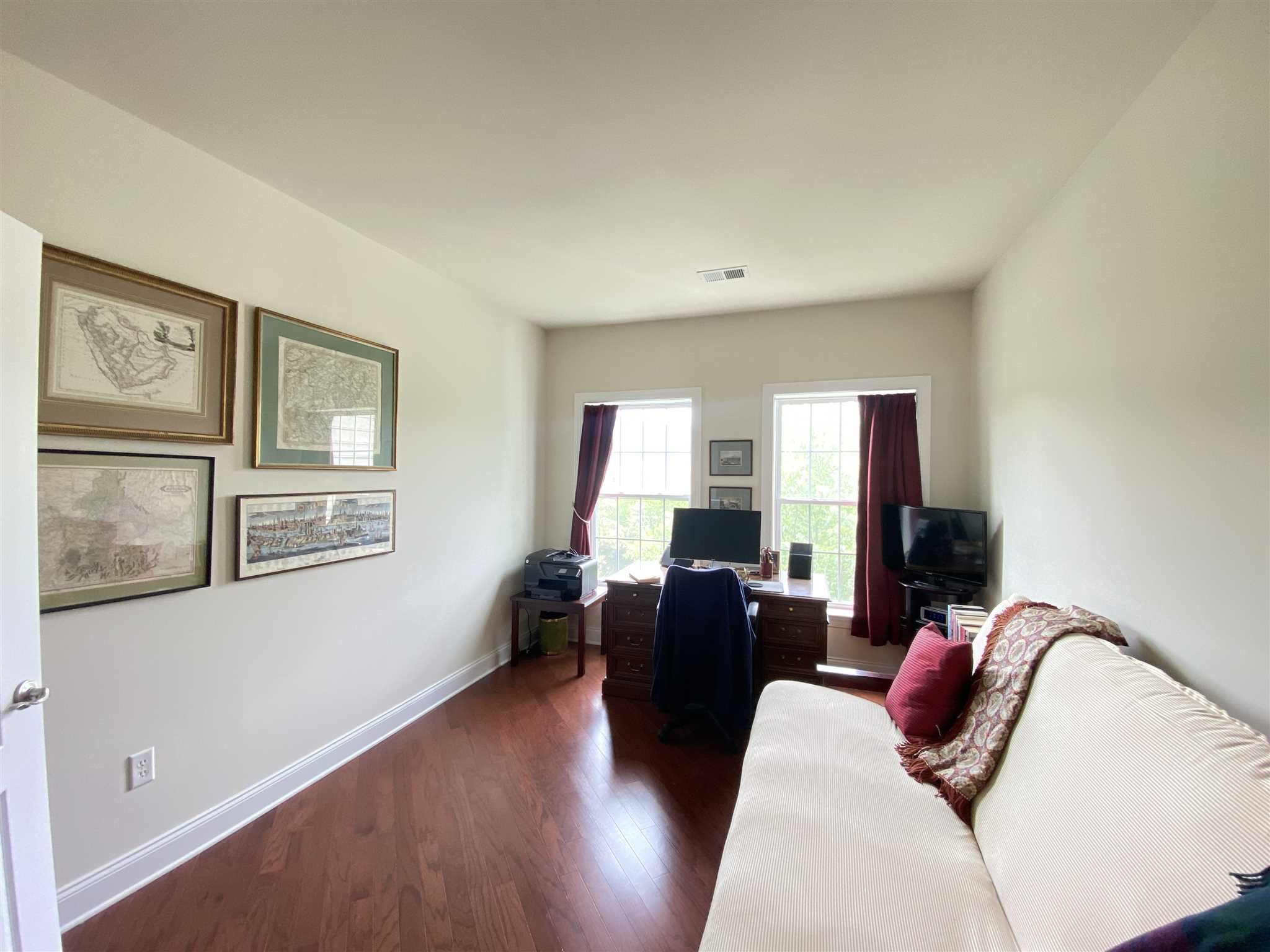 643 Regency Drive Fishkill, NY 12524 - Photo 19 of 37 a bedroom with furniture and wooden floor