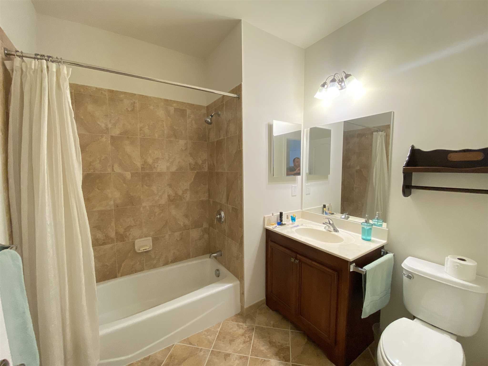 643 Regency Drive Fishkill, NY 12524 - Photo 22 of 37 a bathroom with a sink toilet tub and shower