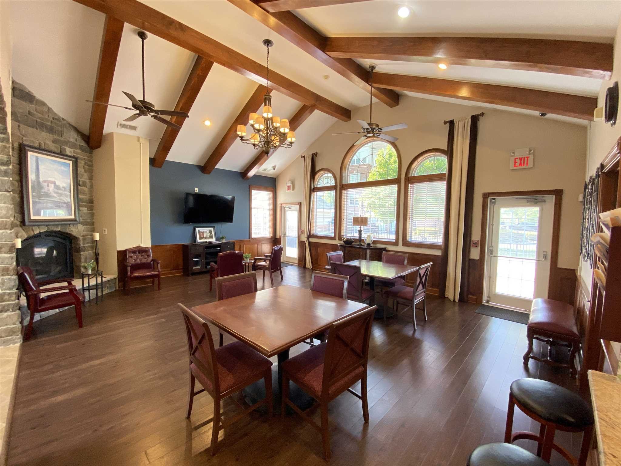 643 Regency Drive Fishkill, NY 12524 - Photo 28 of 37 a living room with furniture a flat screen tv and a large window