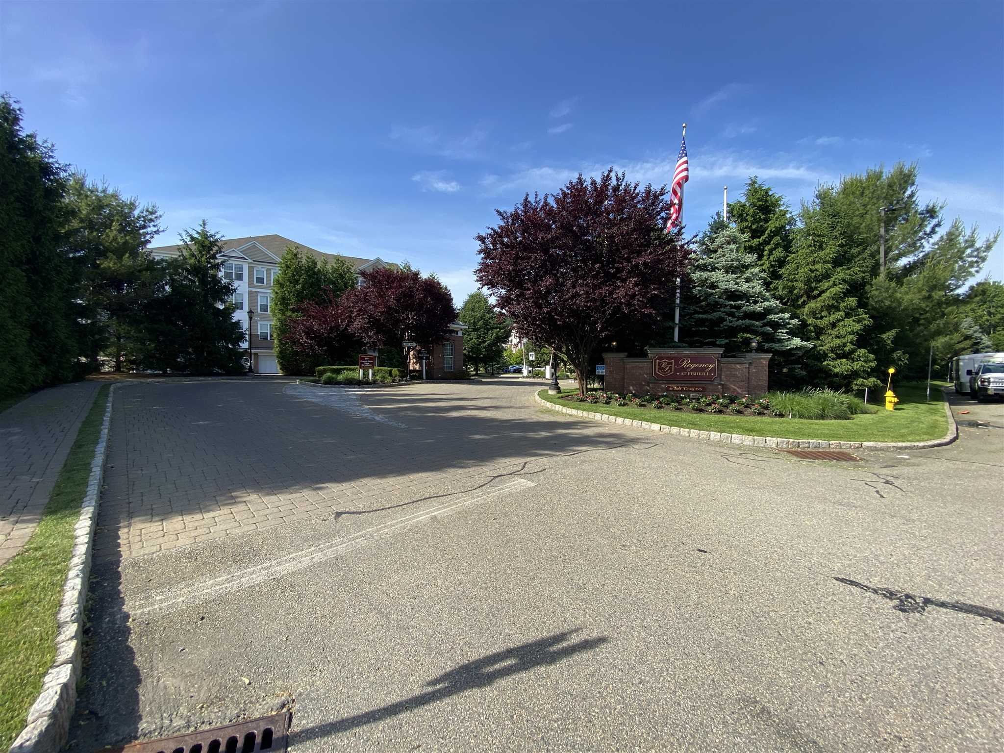 643 Regency Drive Fishkill, NY 12524 - Photo 3 of 37 a backyard of a house with lots of green space