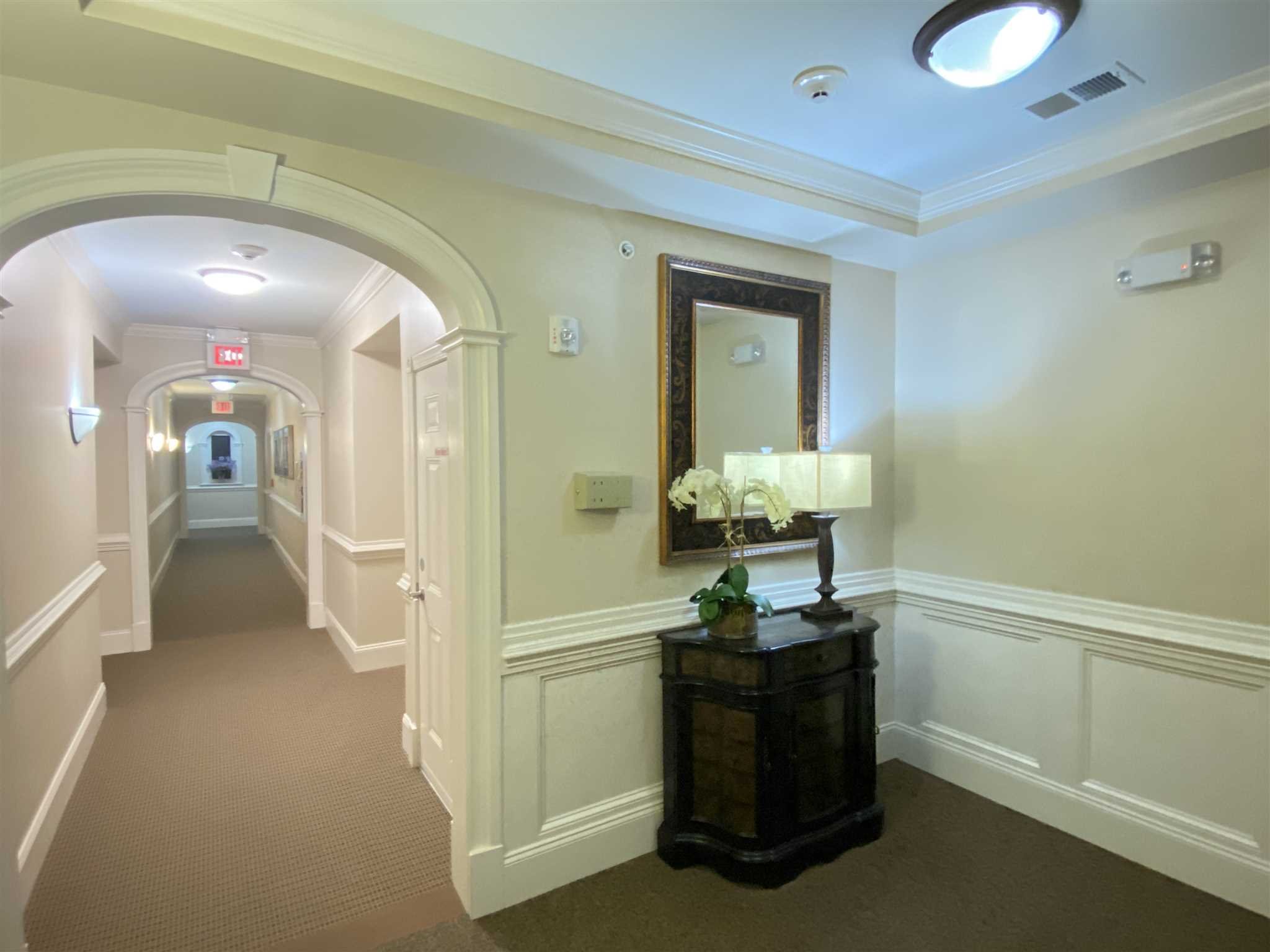 643 Regency Drive Fishkill, NY 12524 - Photo 10 of 37 a living room with a table and gym equipment