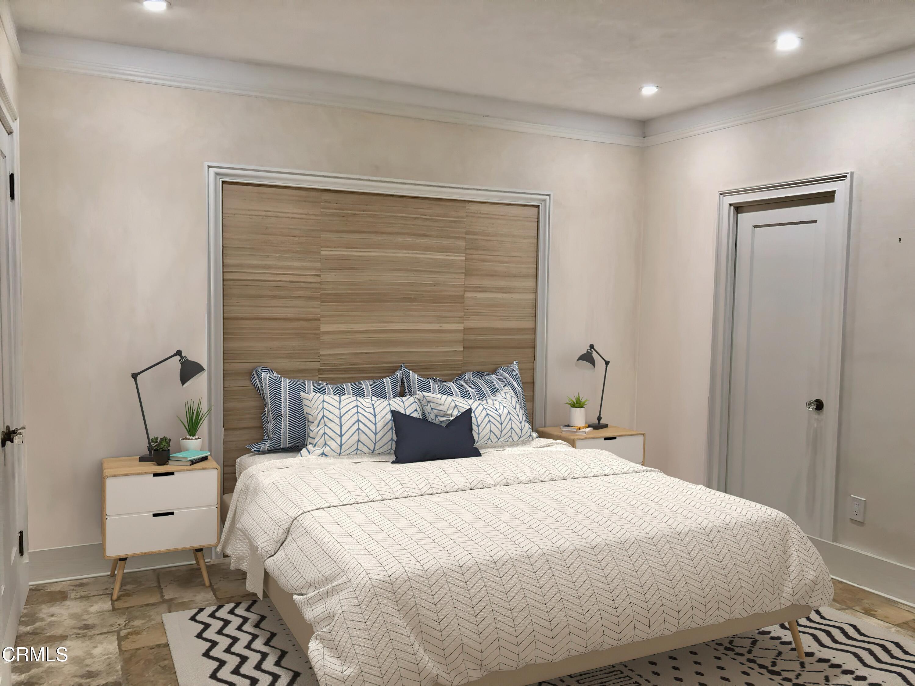 315 West 3rd Street, Unit 301 Long Beach, CA 90802 - Photo 5 of 15 a bedroom with a bed and wooden floor