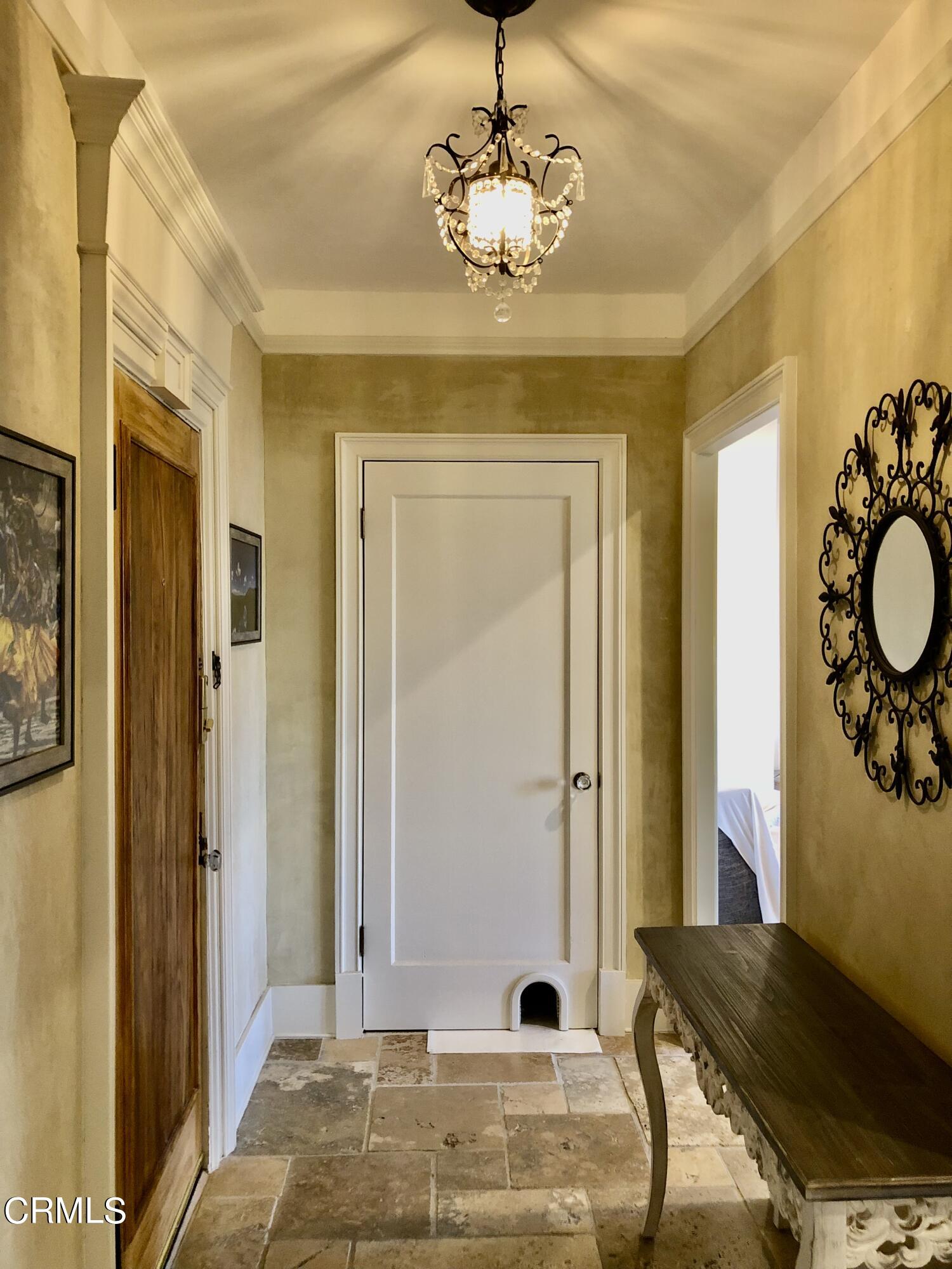 315 West 3rd Street, Unit 301 Long Beach, CA 90802 - Photo 10 of 15 a view of a livingroom with furniture and front door