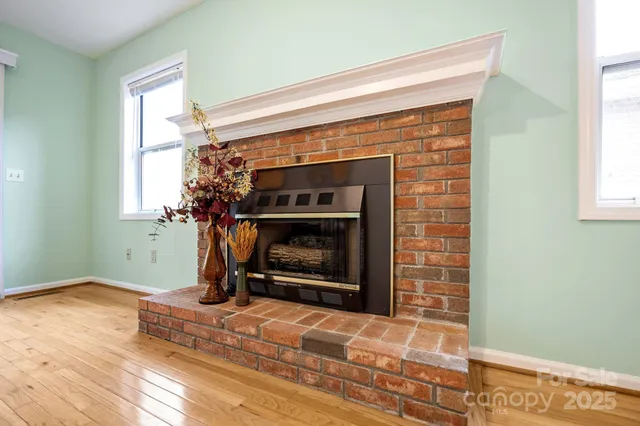a living room with a fireplace