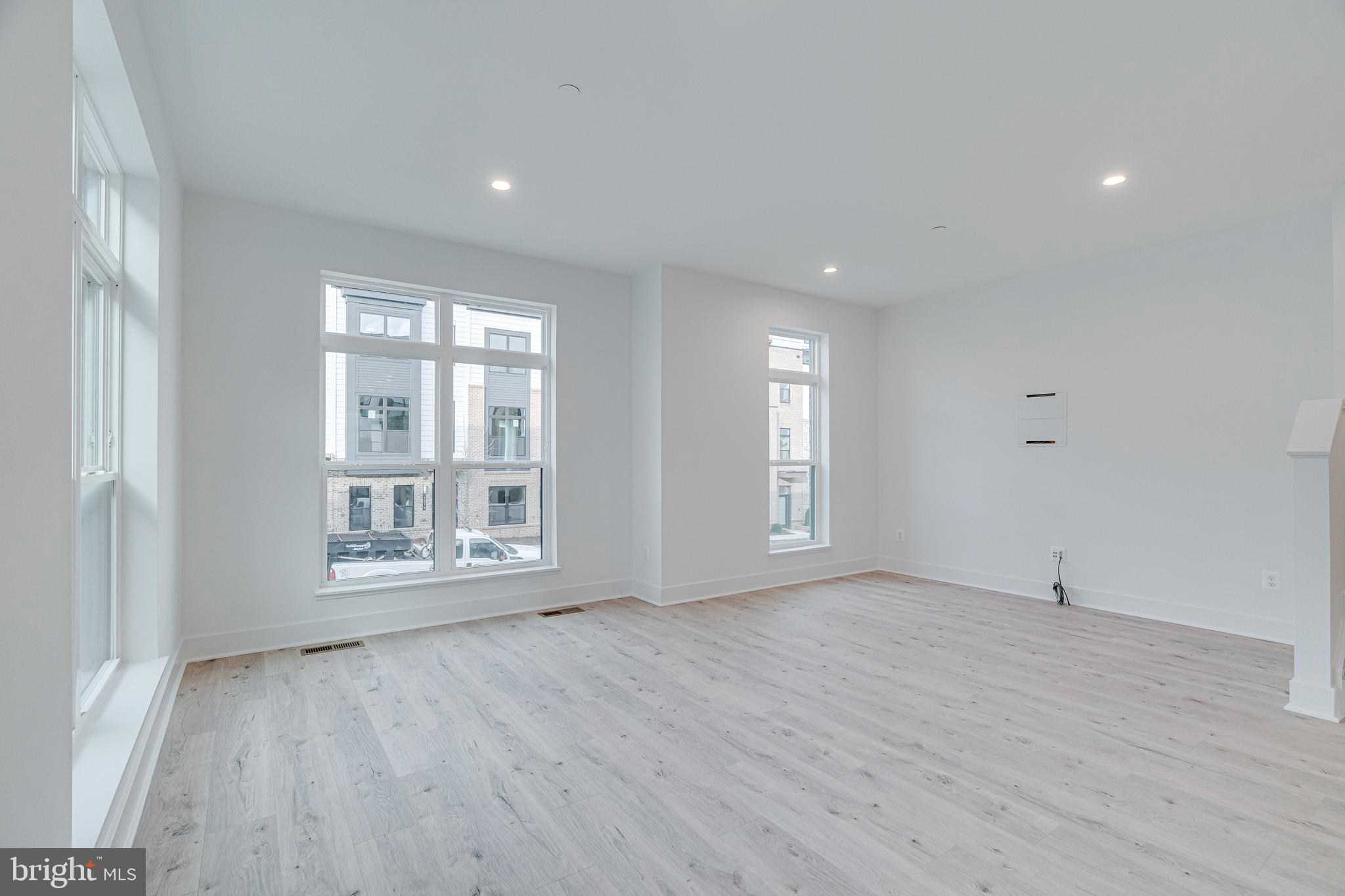 2070 Tysons Ridgeline Road Falls Church, VA 22043 - Photo 18 of 57 wooden floor in an empty room with a window