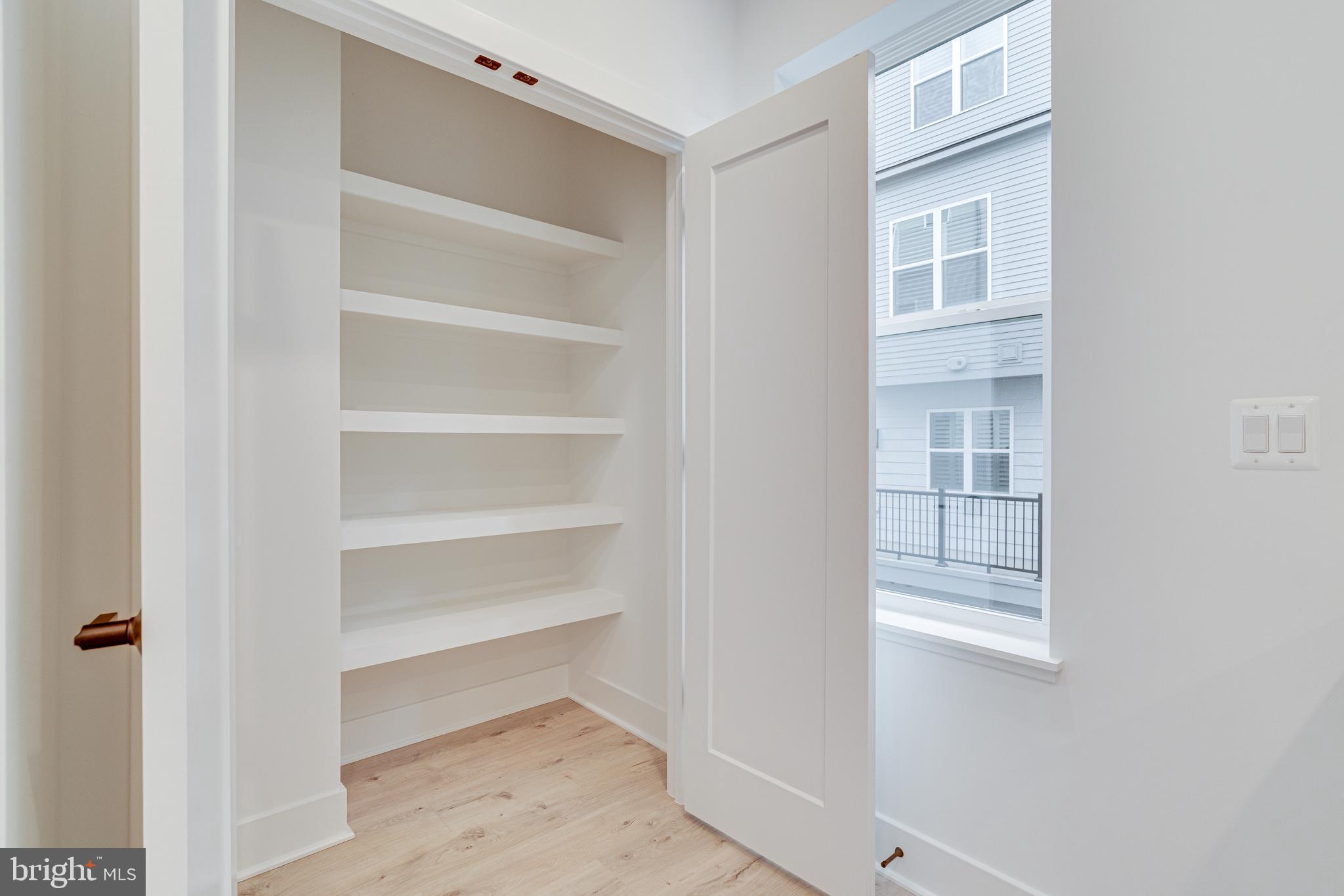 2070 Tysons Ridgeline Road Falls Church, VA 22043 - Photo 27 of 57 a room with walk in closet and a window