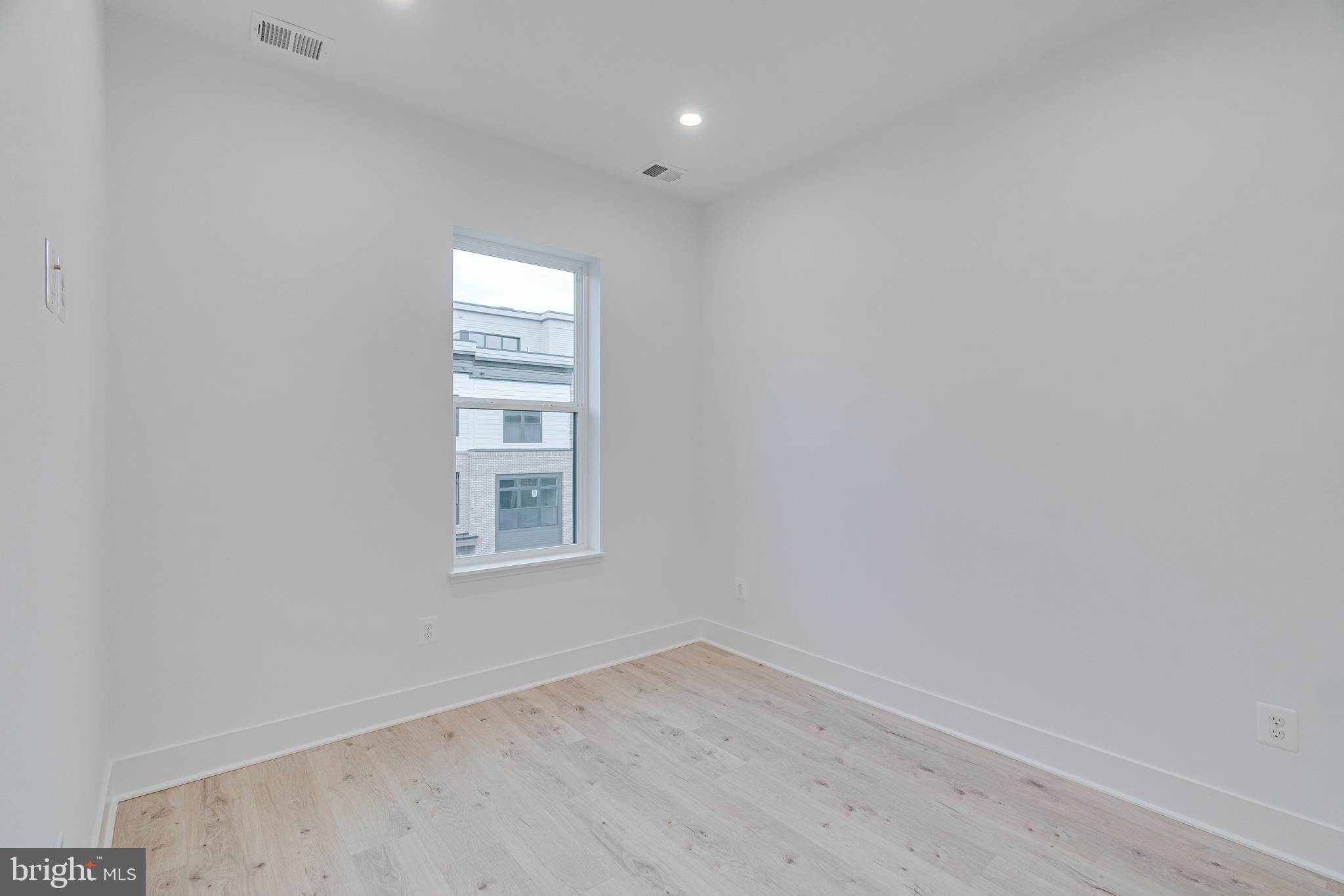 2070 Tysons Ridgeline Road Falls Church, VA 22043 - Photo 41 of 57 an empty room with a window