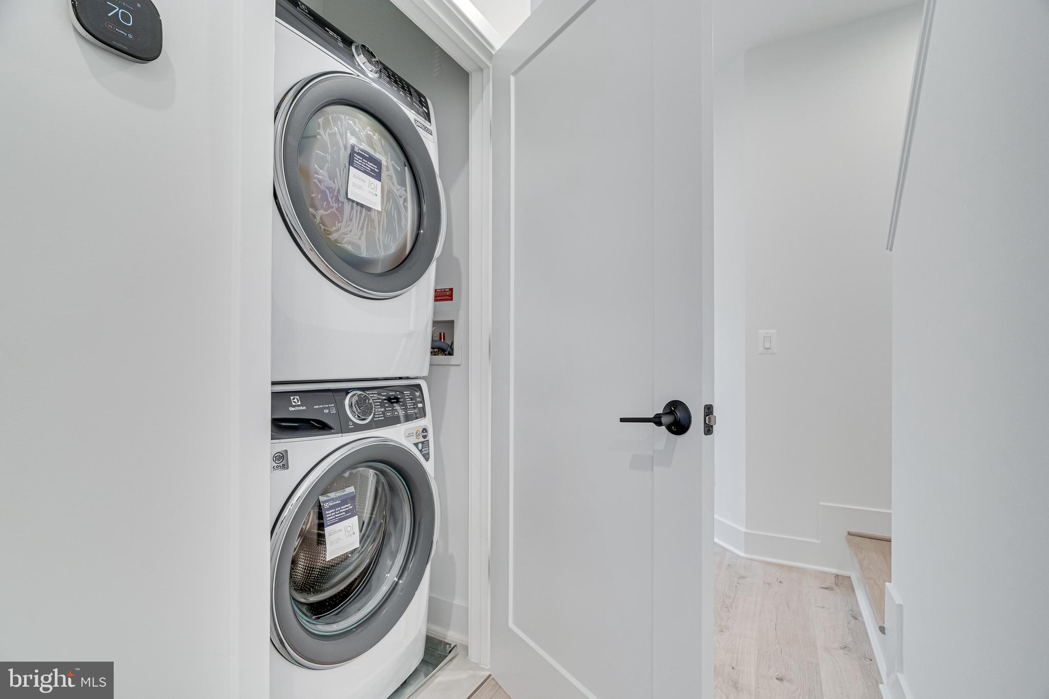 2070 Tysons Ridgeline Road Falls Church, VA 22043 - Photo 45 of 57 a utility room with dryer and washer