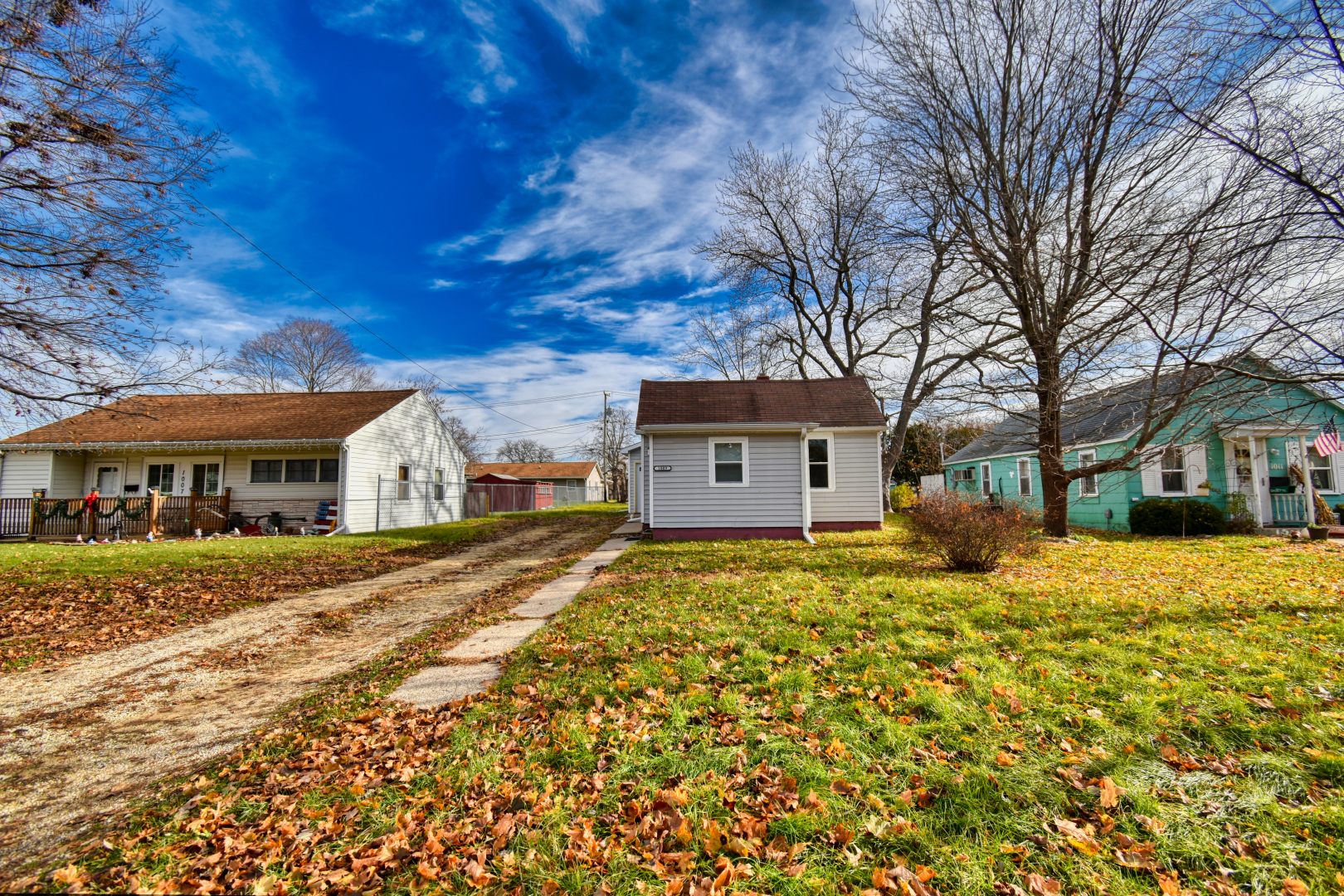 1009 8th Avenue Rock Falls, IL 61071 - Photo 3 of 23 a front view of a house with a yard