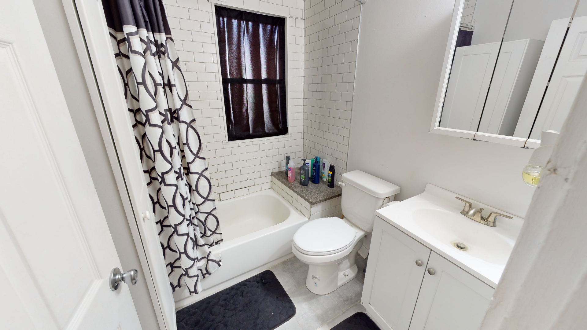 1009 8th Avenue Rock Falls, IL 61071 - Photo 10 of 23 a bathroom with a sink toilet and shower