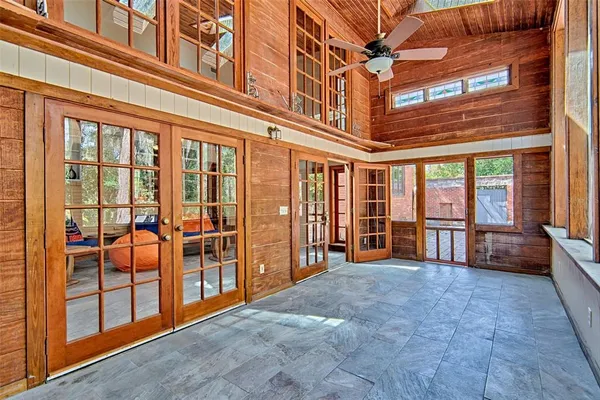 a view of entryway with wooden floor and staircase