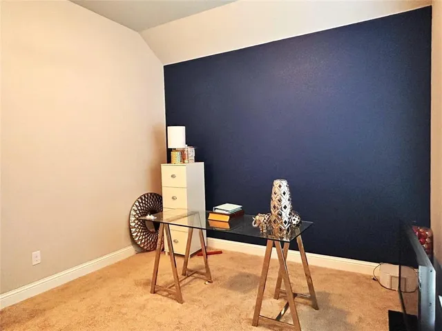 a view of room with air conditioner and window