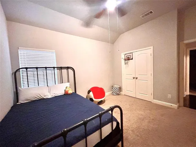 a bathroom with a sink a toilet a mirror and bathtub