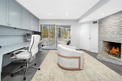 a kitchen with white cabinets and appliances