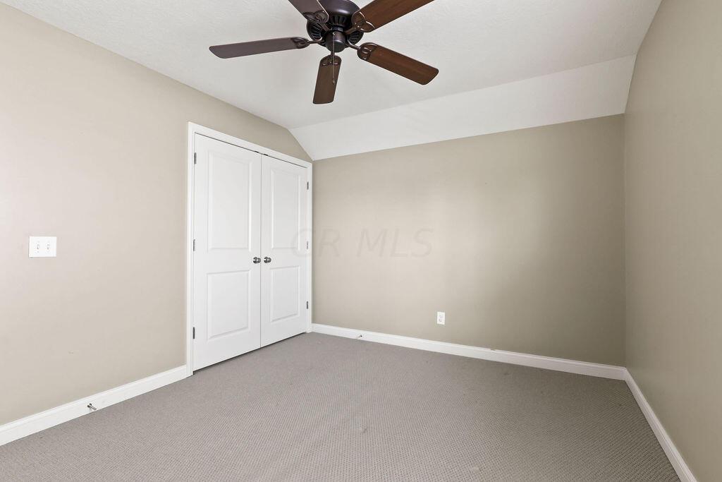 6163 Jennis Road Westerville, OH 43081 - Photo 30 of 44 • Tan carpet
• Tan painted walls
• Ceiling fan
• Closet with (2) doors
• 2” blinds