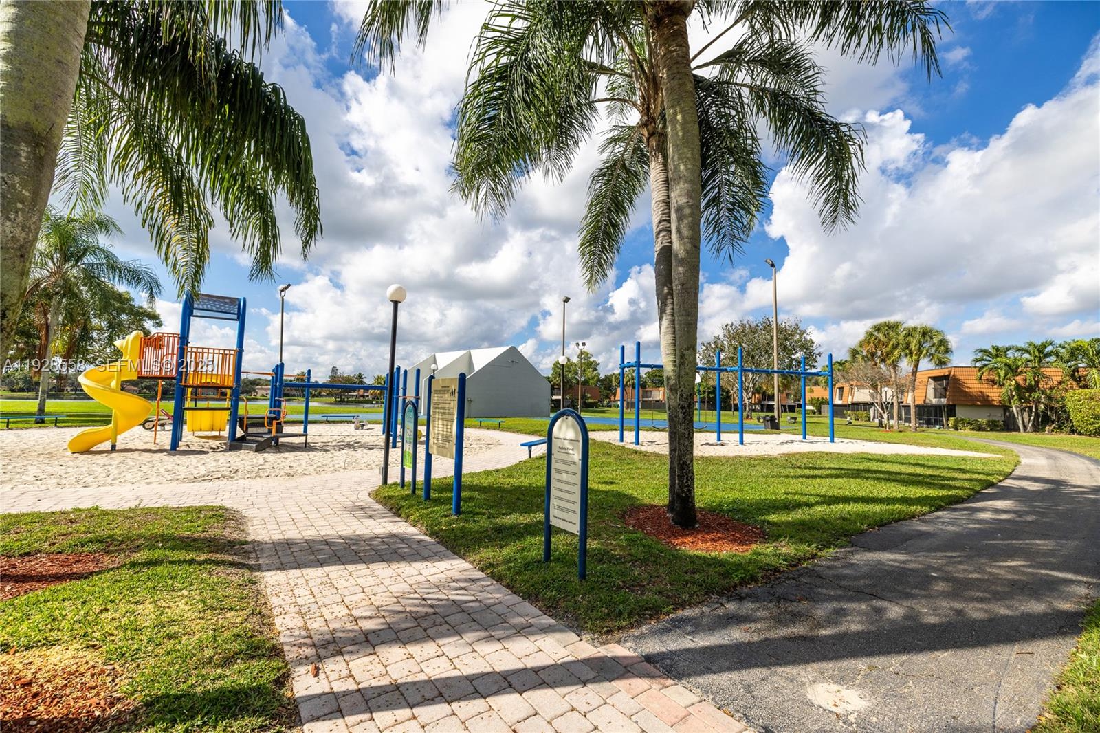11006 North Harmony Lake Circle Davie, FL 33324 - Photo 37 of 46 a view of a park with palm trees