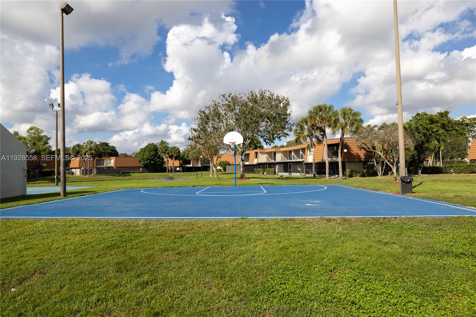 11006 North Harmony Lake Circle Davie, FL 33324 - Photo 39 of 46 a view of a tennis court