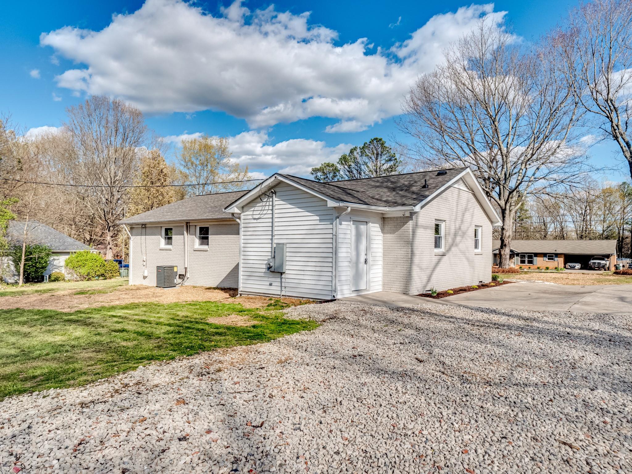 1813 Timber Ln Drive Monroe, NC 28110 - Photo 12 of 35 a view of a house with a patio