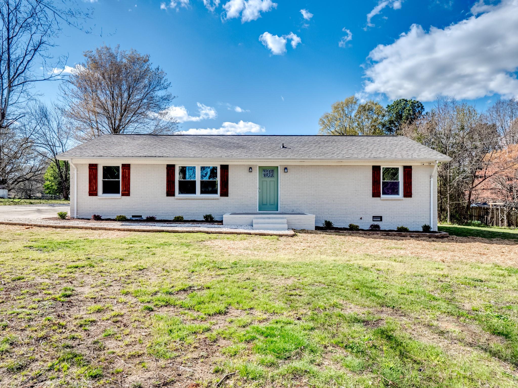 1813 Timber Ln Drive Monroe, NC 28110 - Photo 2 of 35 a front view of house with yard