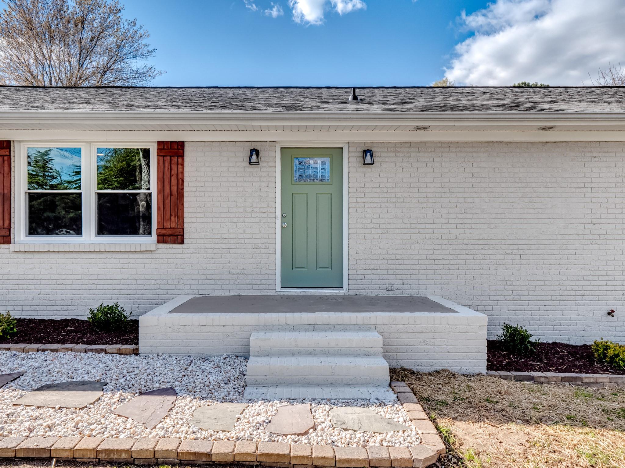 1813 Timber Ln Drive Monroe, NC 28110 - Photo 4 of 35 a front view of a house with a yard
