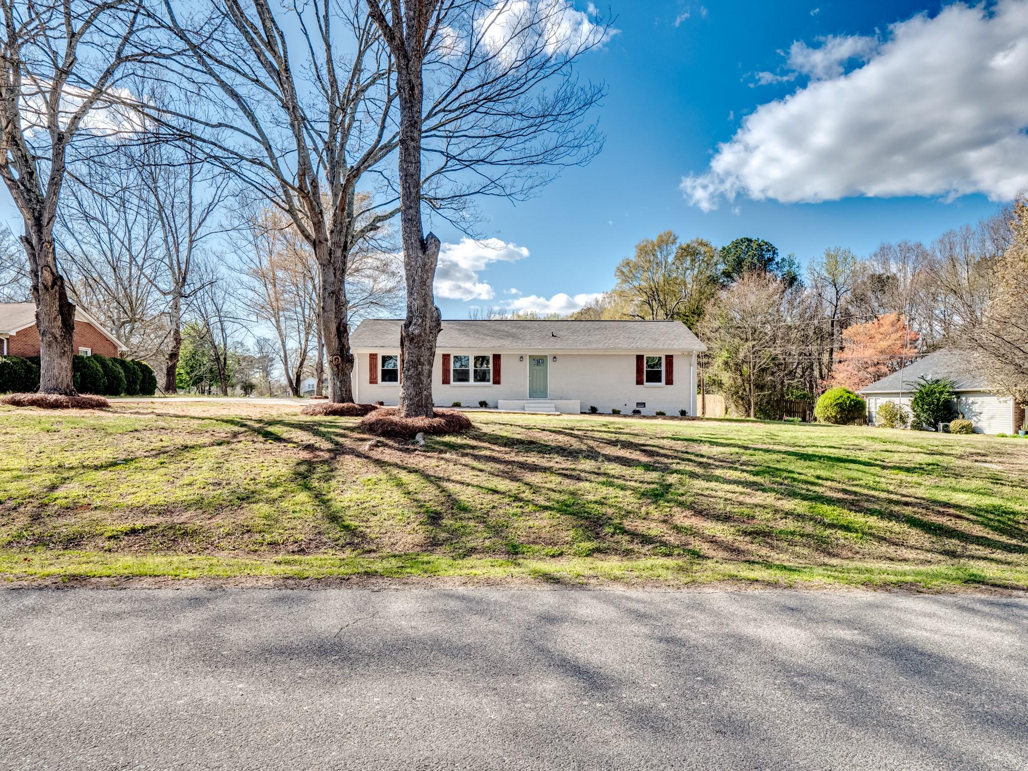 1813 Timber Ln Drive Monroe, NC 28110 - Photo 5 of 35 a swimming pool with outdoor seating