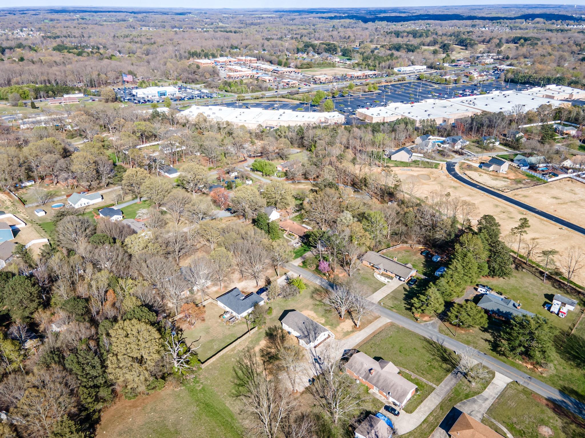 1813 Timber Ln Drive Monroe, NC 28110 - Photo 7 of 35 an aerial view of residential houses with outdoor space