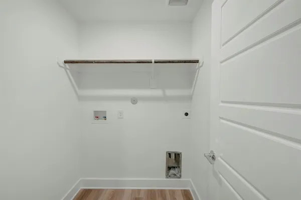 a view of room with window and closet