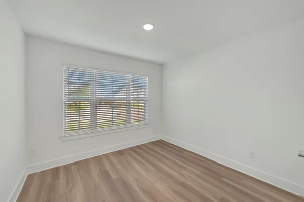 a view of hallway with closet