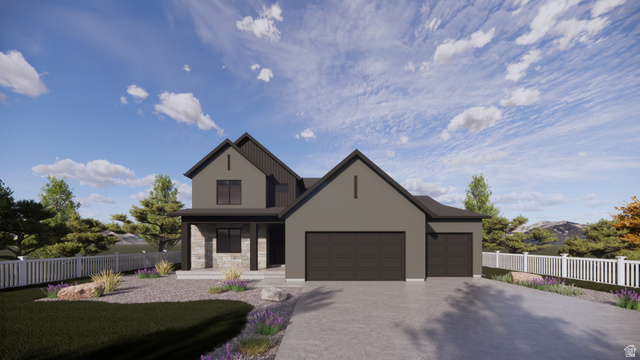 Modern exterior featuring a dark gray facade with stone accents, a two-car garage, an additional single-car garage, and a white picket fence bordering the property