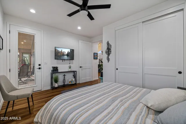 a view of chairs and table in the balcony