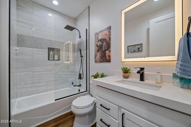 a view of a patio with couches and potted plants
