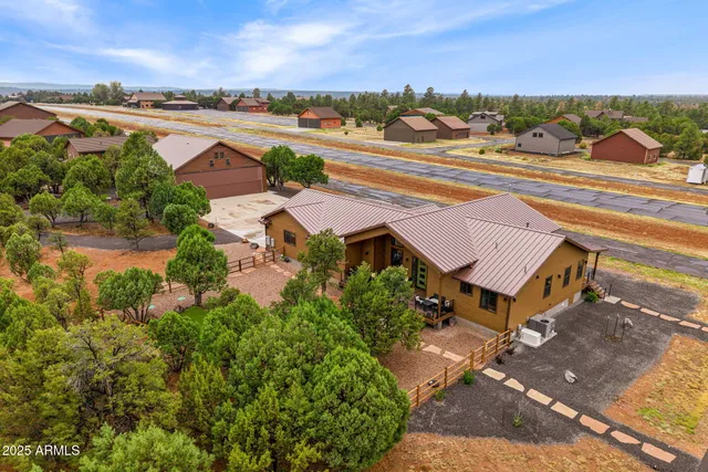 an aerial view of a house with a outdoor space