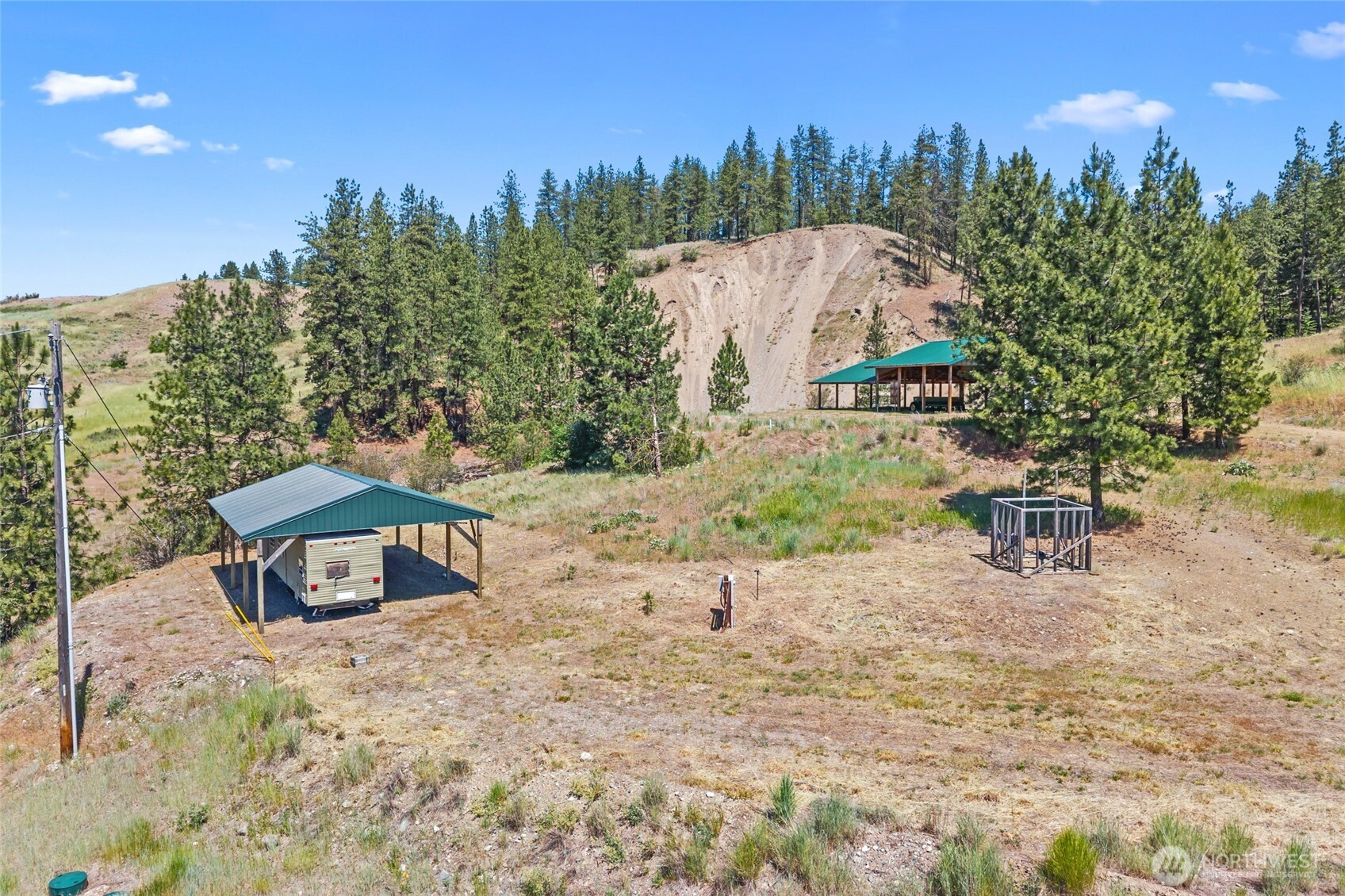 5793 Fruitland Valley Road Fruitland, WA 99129 - Photo 23 of 34 a view of a bench in the backyard of a house