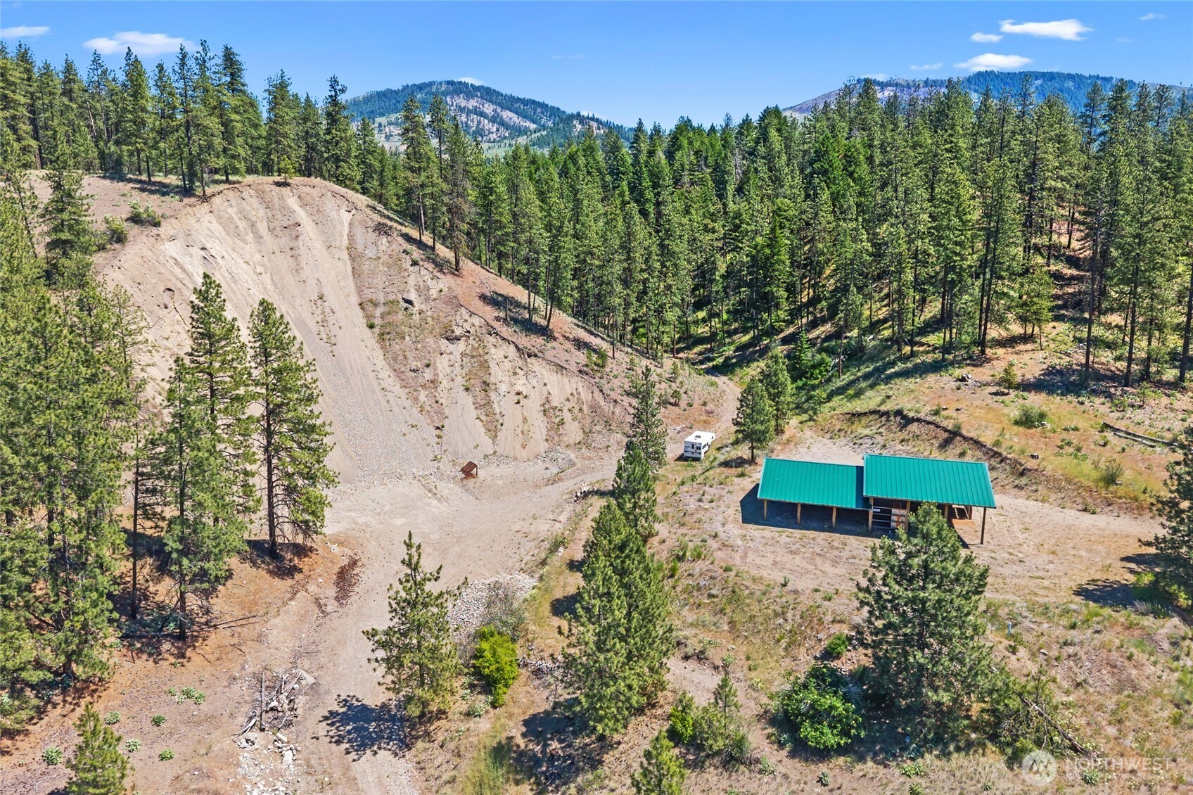 5793 Fruitland Valley Road Fruitland, WA 99129 - Photo 24 of 34 a view of a garden with a building in the background