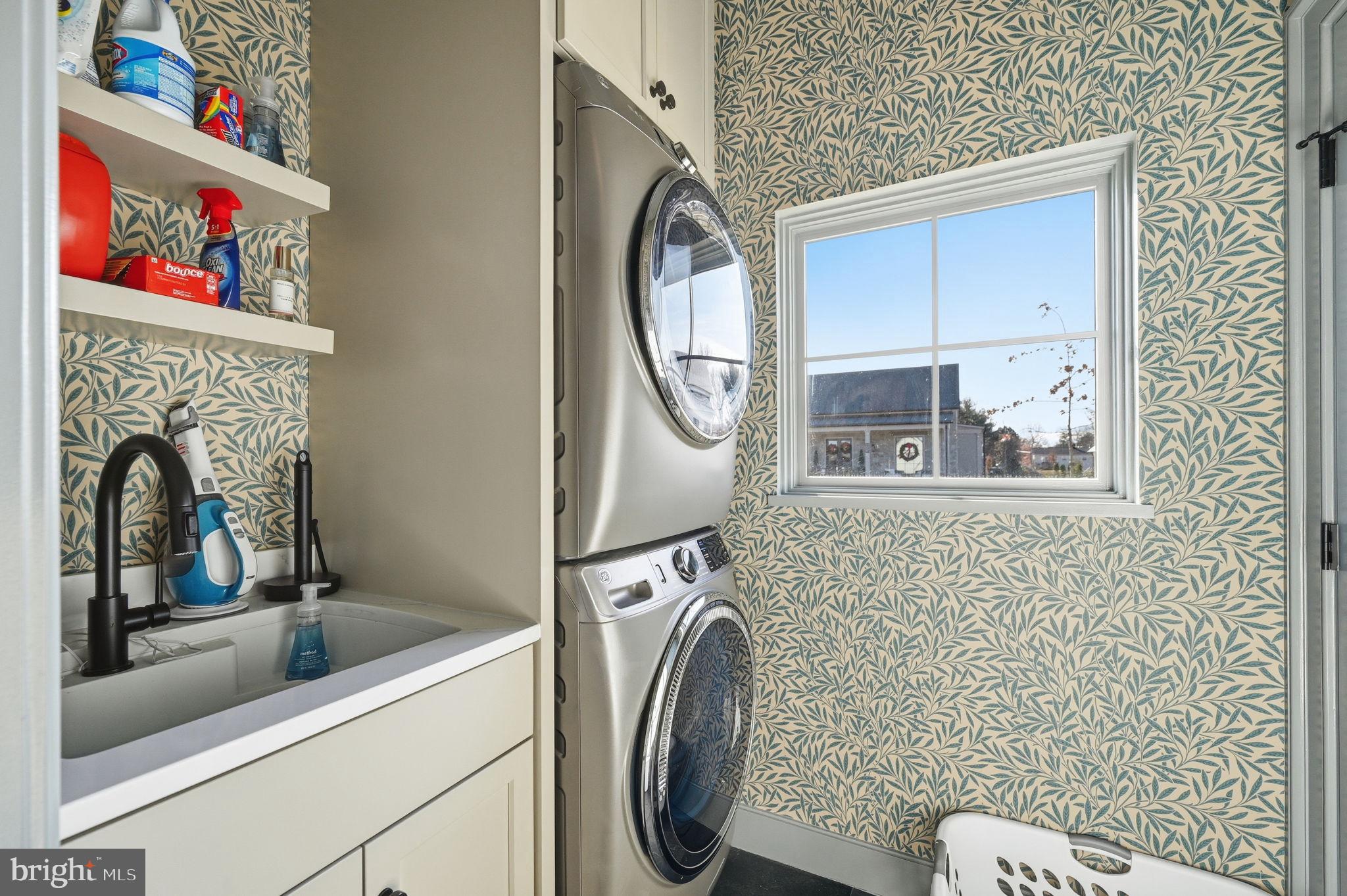 604 Martingale Ridge Drive Middleburg, VA 20117 - Photo 22 of 53 Charming laundry nook with stylish wallpaper.