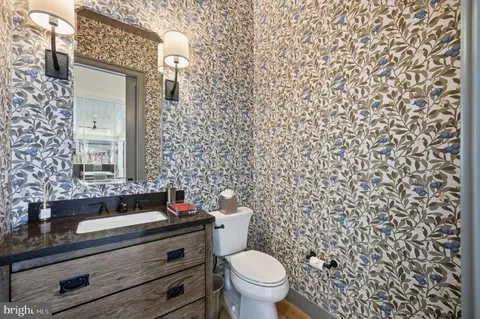 a bedroom with a bed and a view of bathroom