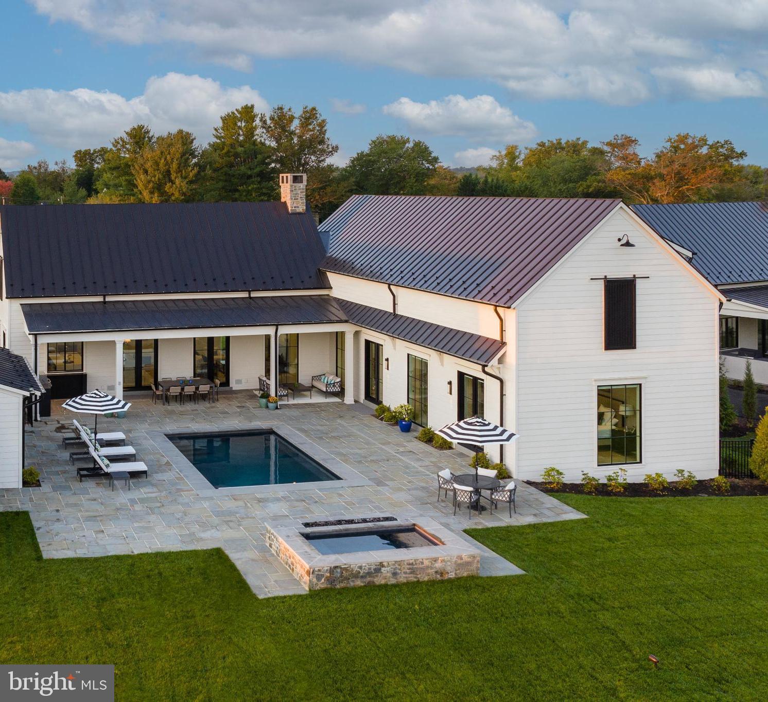 604 Martingale Ridge Drive Middleburg, VA 20117 - Photo 51 of 53 Modern home with pool and lush landscaping.