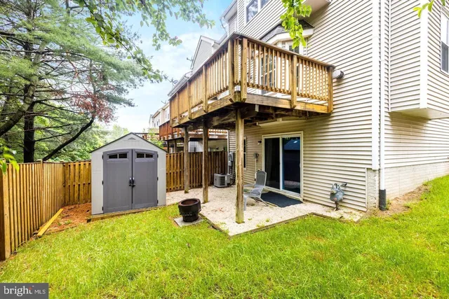 a view of a house with a yard and porch