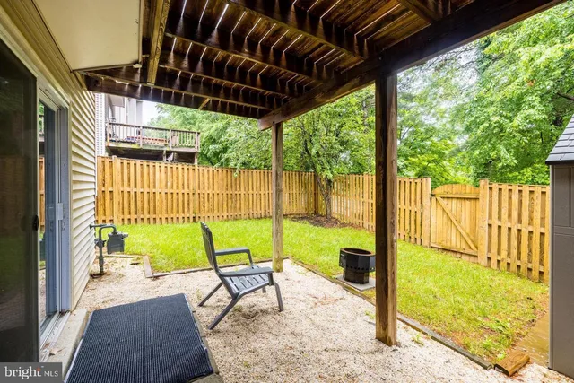 a view of swimming pool with a patio