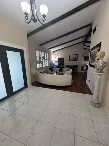 a living room with couches and furniture