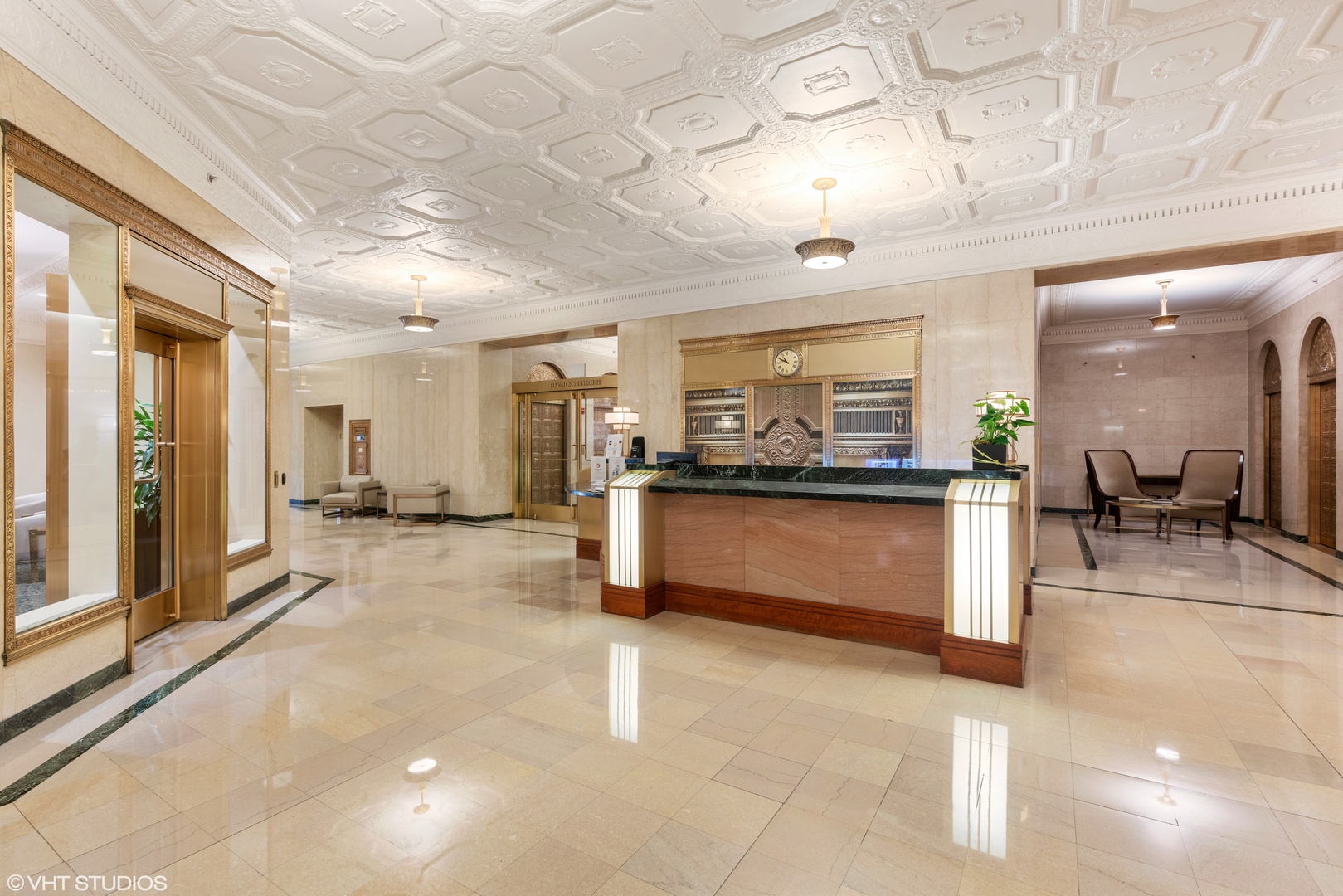 310 South Michigan Avenue, Unit 1010 Chicago, IL 60604 - Photo 2 of 15 a view of a hallway with a dining table chairs