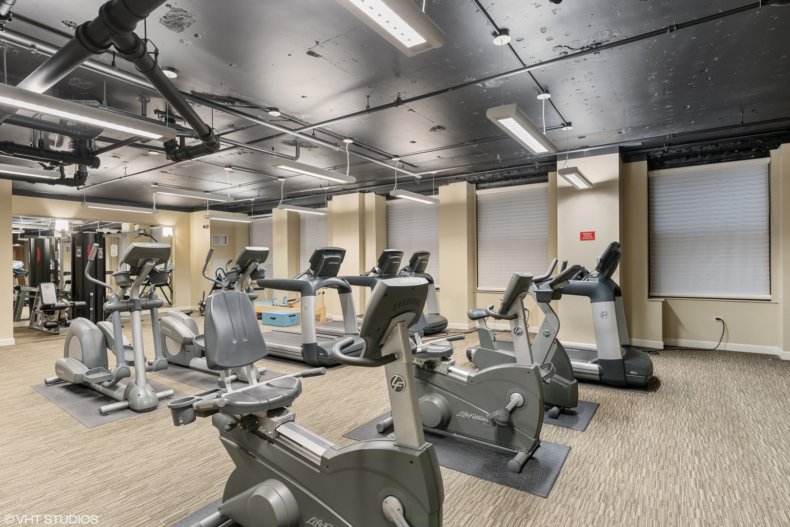 310 South Michigan Avenue, Unit 1010 Chicago, IL 60604 - Photo 13 of 15 a room with gym equipment and view of gym equipment