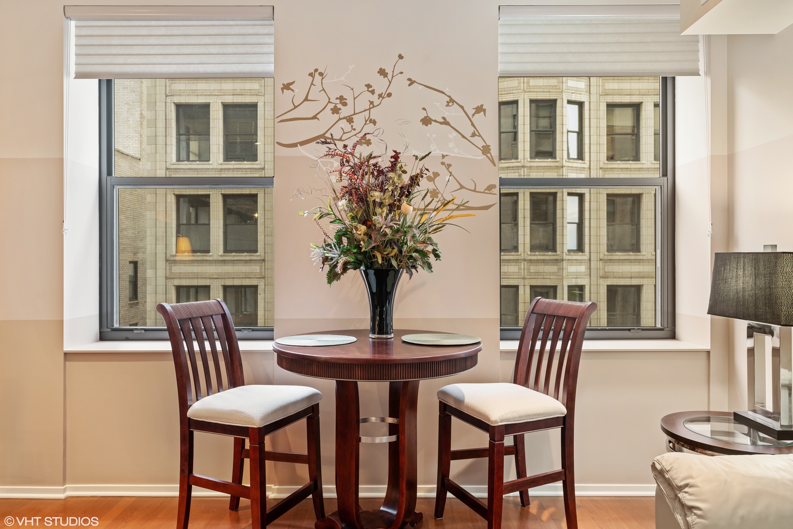 310 South Michigan Avenue, Unit 1010 Chicago, IL 60604 - Photo 9 of 15 a view of a dining room with furniture and chandelier