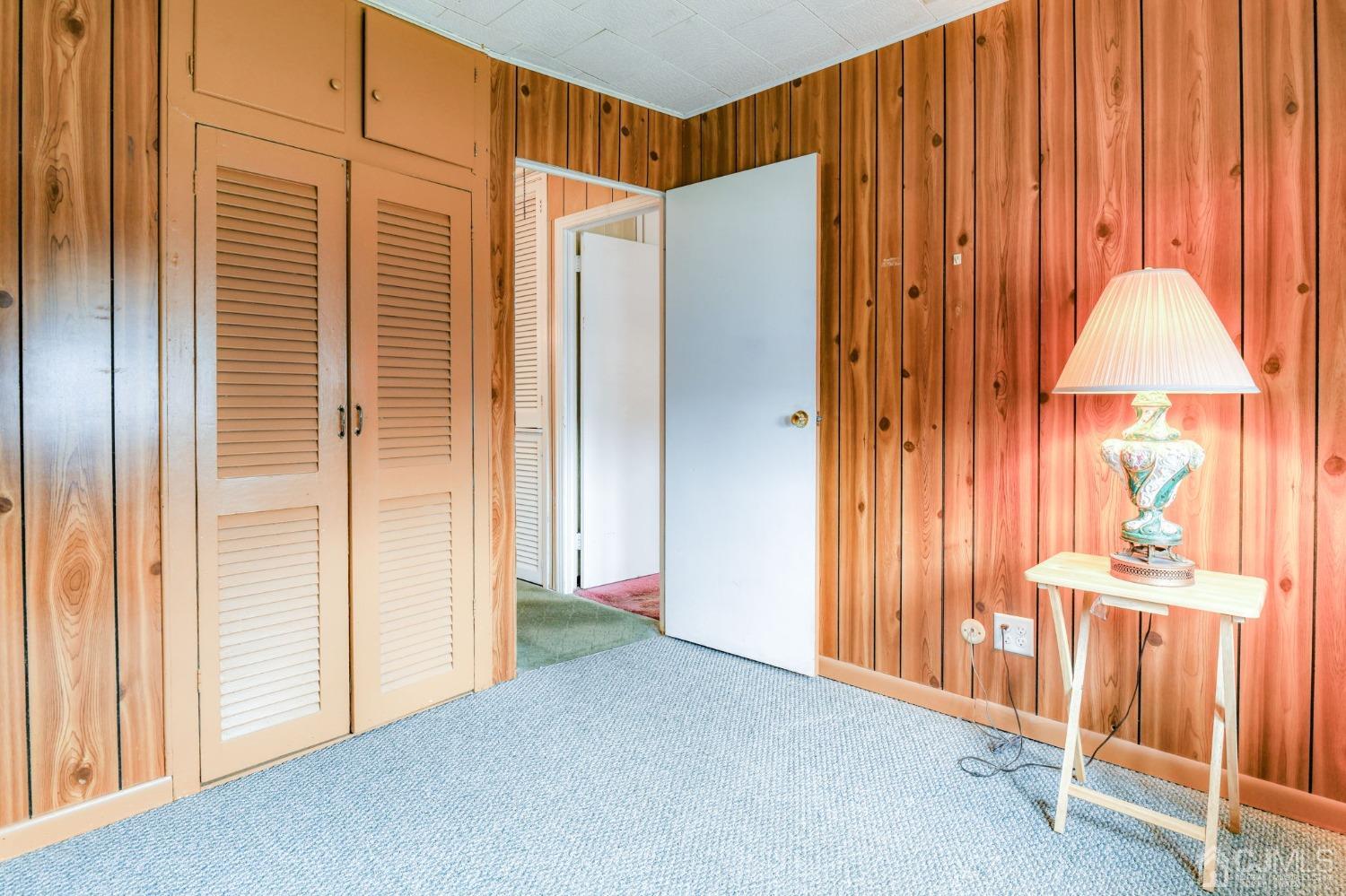 22 Parkerson Road Edison, NJ 08817 - Photo 15 of 29 an empty room with wooden floor and windows