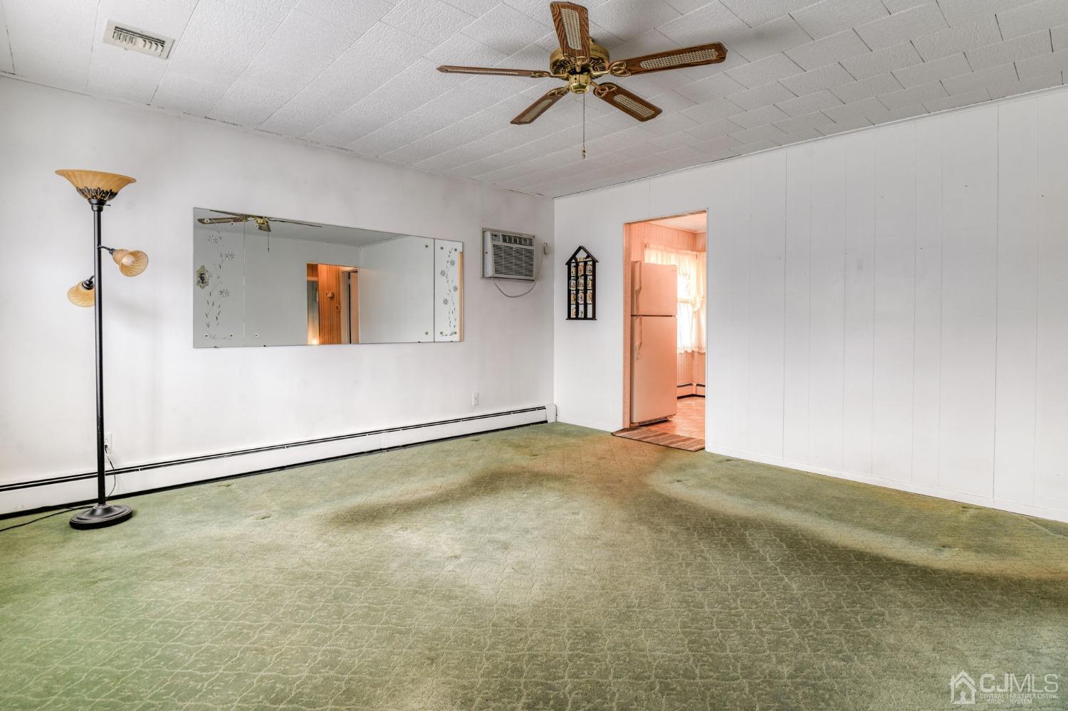 22 Parkerson Road Edison, NJ 08817 - Photo 2 of 29 a view of an empty room with a window